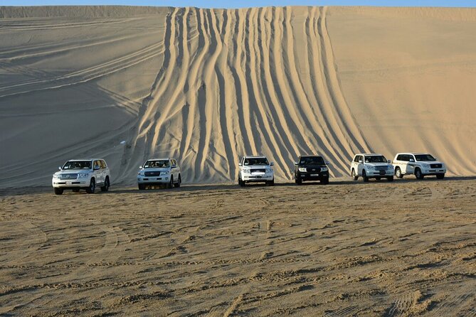 Desert Safari, Camel ride and Inland Sea Tour - The unusual setting where sand meets sea