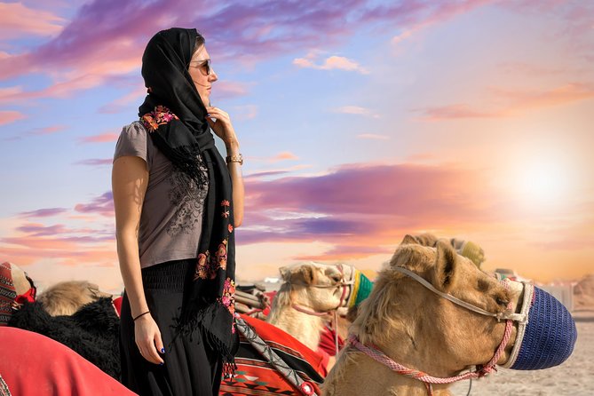 Desert Safari with Camel Ride, Sand Boarding & Inland Sea Tour in Doha - Camel riding: a short introduction, not a trek
