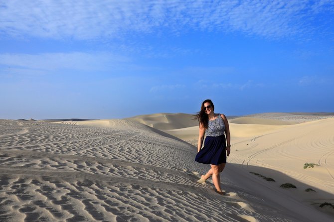 Desert Safari with Camel Ride, Sand Boarding & Inland Sea Tour in Doha - Sandboarding from the dune tops