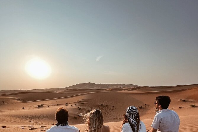 Desert Safari with Quad Bike Camel ride ,SandBoarding ,InalndSea - Dune Driving: The Most Physical Part of the Day