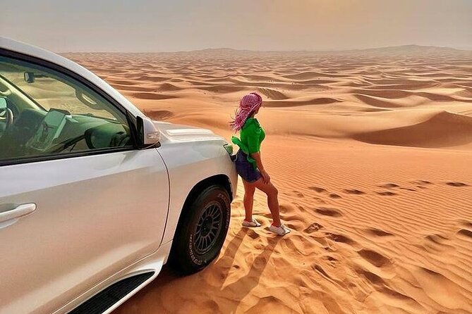 Desert Safari with Quad Bike Camel ride ,SandBoarding ,InalndSea - Tea, Coffee, Camels, and a Useful First Stop
