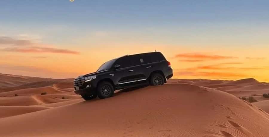 Doha: ATV Quad Bike and Buggy Desert Safari with Camel Ride - The high dune photo stop