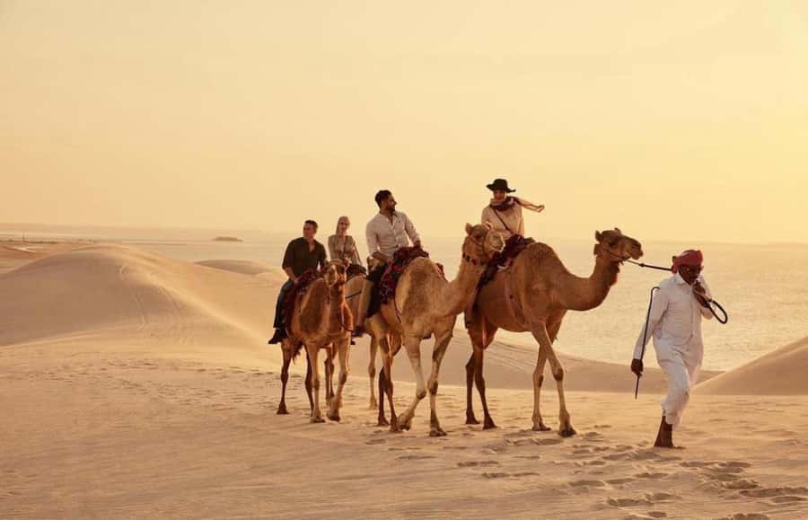 Doha: ATV Quad, Buggy Dune Bashing,Camel Ride & Sandboarding - Sandboarding and the best photo stop