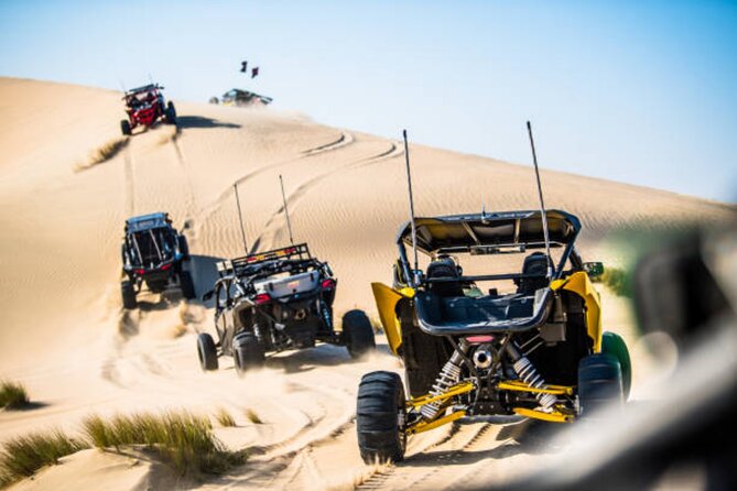Doha Desert Quad Bike adventure with group, and Sand dune Driving - Sandboarding without a long lesson