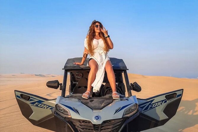 Doha Desert Safari Camel Ride Dune Bashing and ATV Bike - ATV biking and sandboarding on the dunes