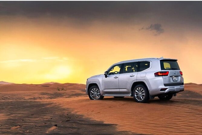 Doha: Desert Safari: Dune Bashing, Quad Bikes & Camel Rides - Tourist Point: Sandboarding, Dune Bashing, and Big Views