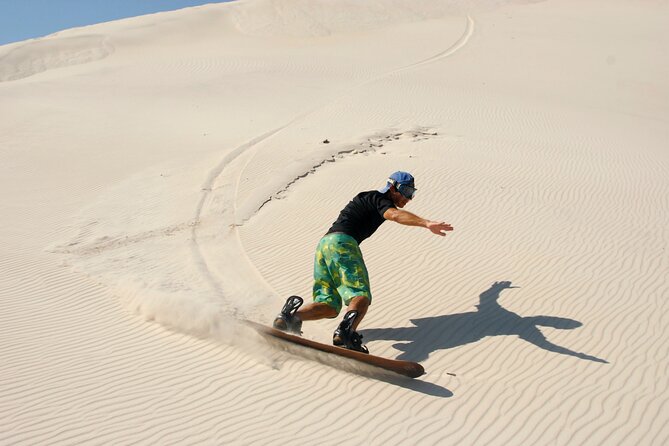 Doha Desert Safari Dune bashing,Sandboarding,CamelRide,Inland Sea - Camels, falcons, and the question of extra charges