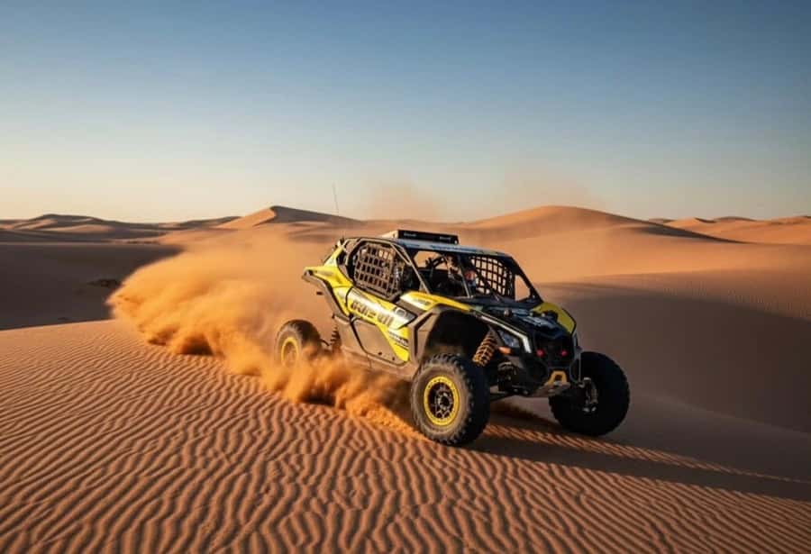 Doha: Desert Safari, Quad Bike, Camel Ride & Inland Sea Tour - Quad biking at the first desert stop