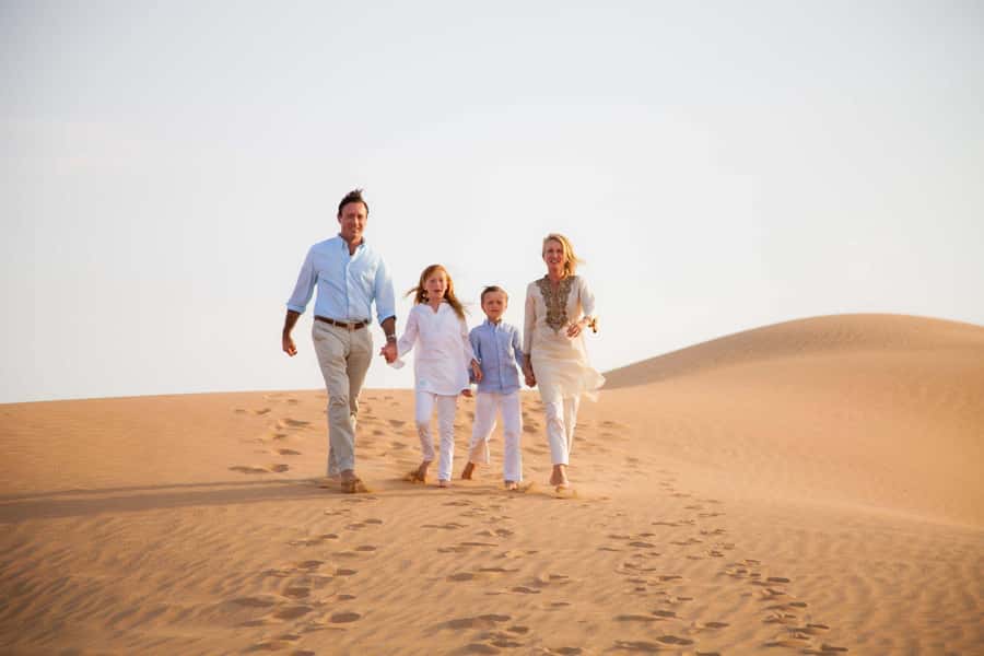 Doha: Desert Safari with Camel Ride Family Friendly Tour - Leaving Doha in a 4x4 Land Cruiser