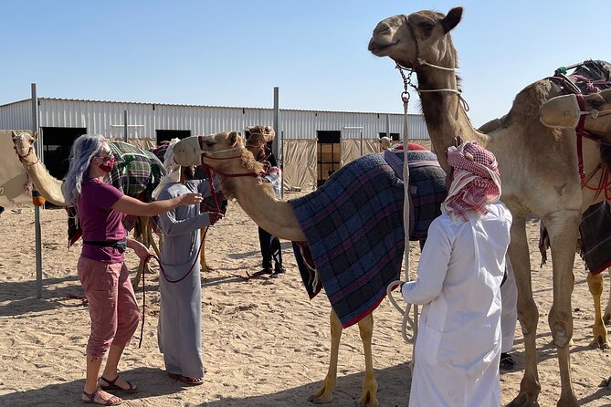 Doha Desert Safari with Camel Ride, Sand Boarding,Inland Sea Tour - Camel riding and Bedouin-style desert culture