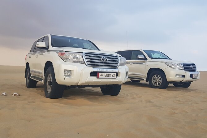 Doha: Desert Safari With Quad bike ,Camel Ride And Sand Boarding - Quad biking: the part requiring the most care