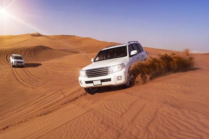 Doha: Desert Safari With Quad bike ,Camel Ride And Sand Boarding - Sealine Beach: a practical stop with optional activities