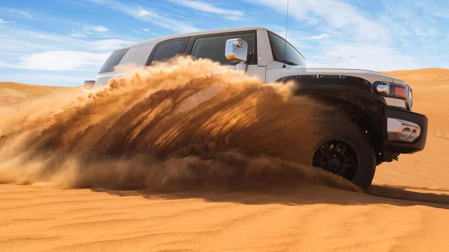 Doha: DesertSafari with Quad Bike, Camel Ride & Sandboarding - Guides, vehicles, and the human side of the trip