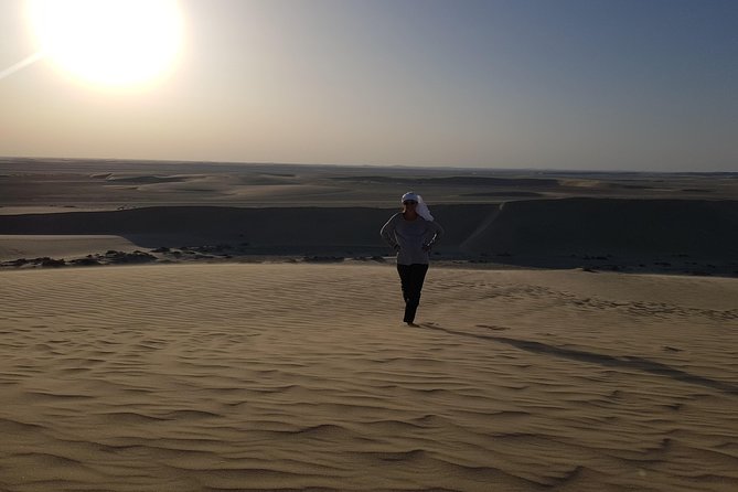 Doha :Half Day Desert Safari | Camel Riding | ATV | Sand Surfing - Sandboarding on the soft dunes