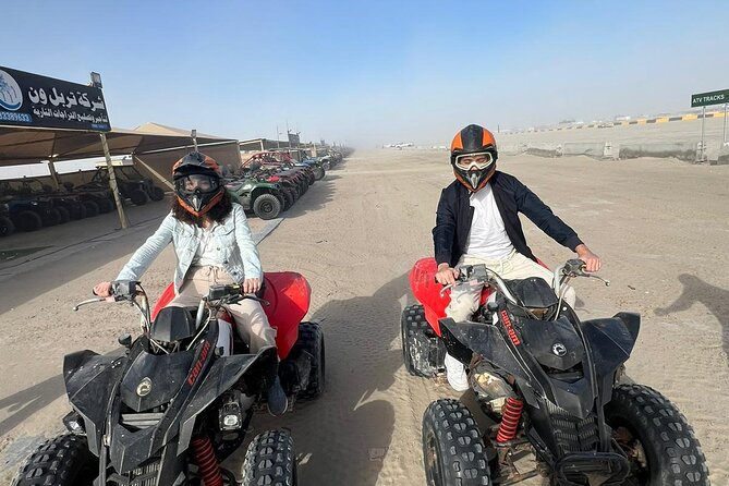 Doha Half Day Desert Safari Dune Bashing Camel Ride Sandboarding - Dune bashing across the sand