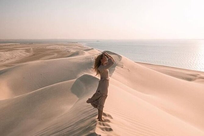 Doha Half Day Desert Safari Dune Bashing CamelRide & Sandboarding - From Doha to Sealine Beach and the Inland Sea