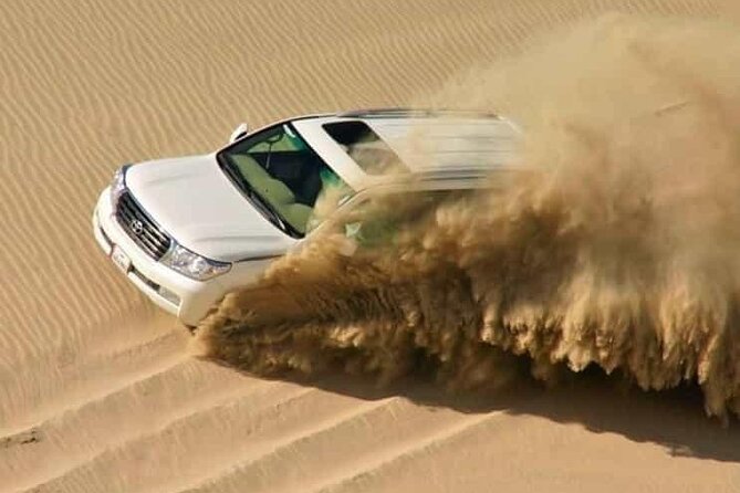 Doha: Half Day Desert Safari with Camel Ride and Inland Sea Tour - Sealine Beach: tea, camels, and a gentle start