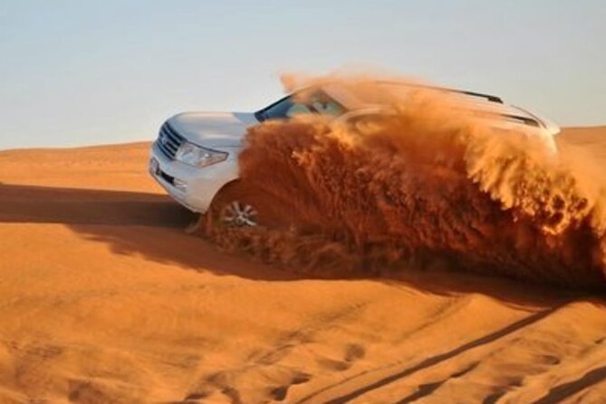 Doha Half Day Desert Safari with Camel Ride and Sand Boarding - Sandboarding at Khor Al Udaid