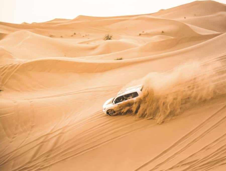 Doha: InlandSea Tour,Camel,Sand Boarding With All Activities - Sunset photographs at the Inland Sea