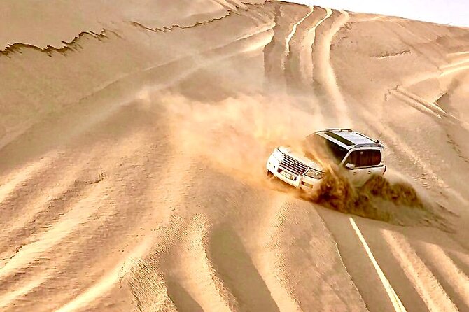 Doha Layover Desert Safari, Camel Ride, Sand Boarding, Inland Sea - The drive across Qatar’s southern dunes