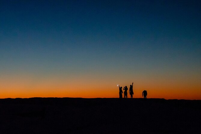 Doha Night Desert Safari Adventure - Sand boarding from the high dunes