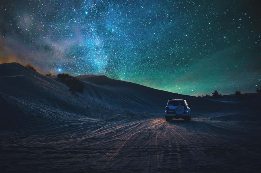 Doha: Night Safari with Dune Bashing and Camel Ride - A short camel ride at sunset