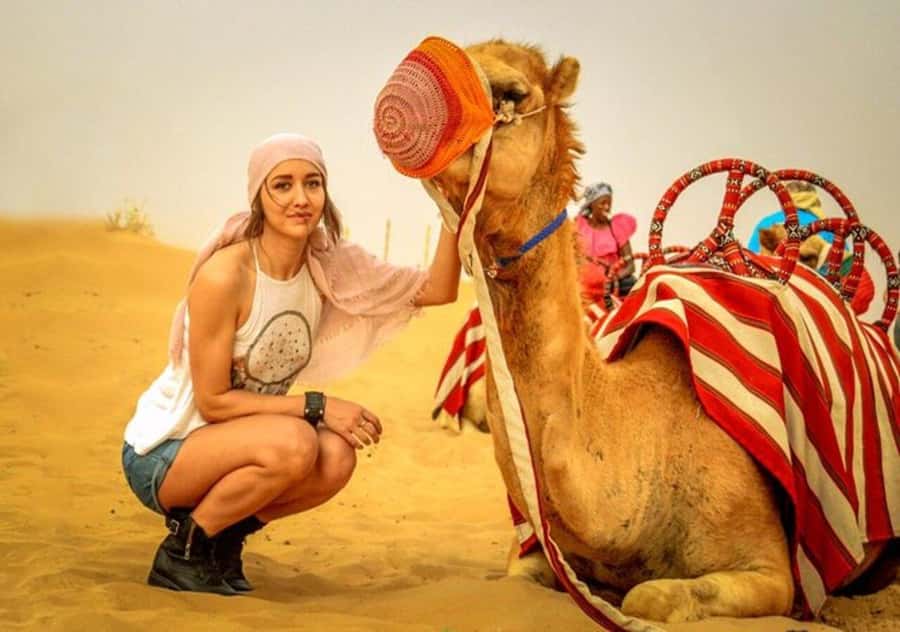 Doha: Overnight Desert Camping With BBQ Dinner & Breakfast - Al Wakrah, camels, and the first desert stop