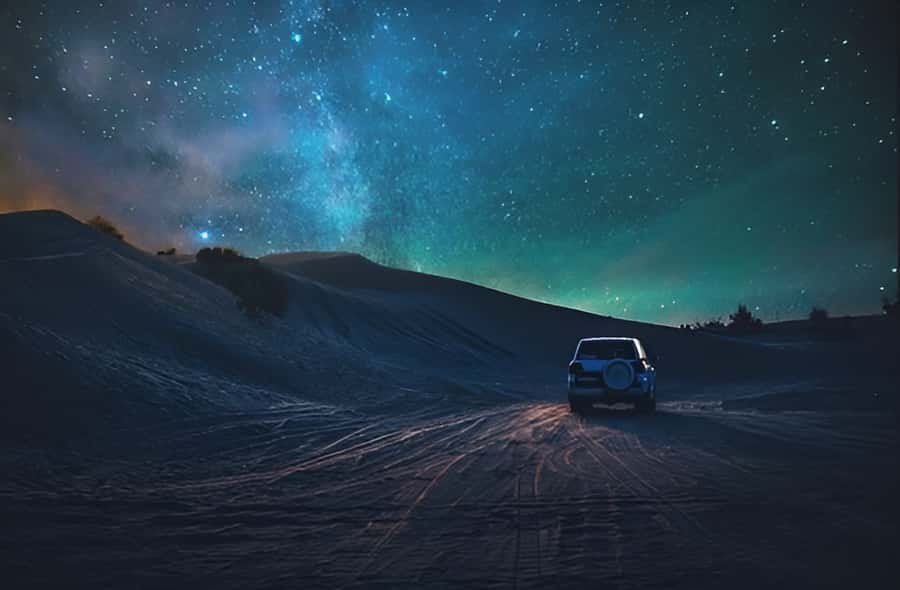Doha: Overnight Desert Safari with 4x4 Ride and Camp Stay - Sunset, bonfire, and the quiet hours