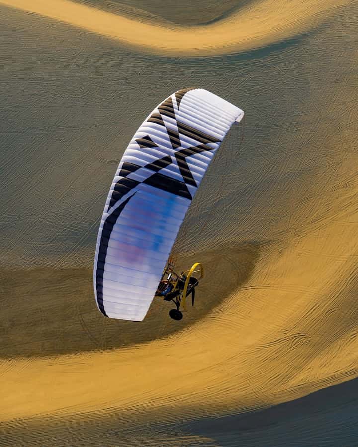 Doha: Paratrike Air Tour with Hotel Pickup and Drop-off - From Doha to Sealine in an air-conditioned 4x4