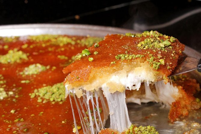 Doha: Pearl Island Food Tour – 7 Tastings, AC Vehicle - Karak Tea and Cheese Chapati at Porto Arabia