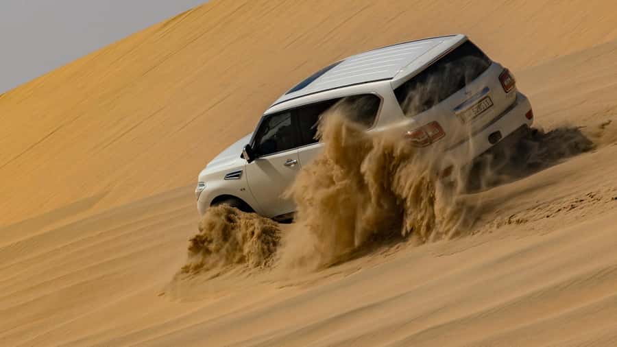 Doha Private Desert Safari, inland sea, sand boarding - Dune bashing and sandboarding on the Sealine dunes