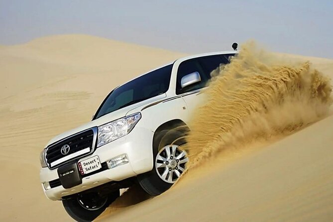 Doha: Private Half Day Desert Safari Tour in Qatar - Sealine Beach and the first real sand action