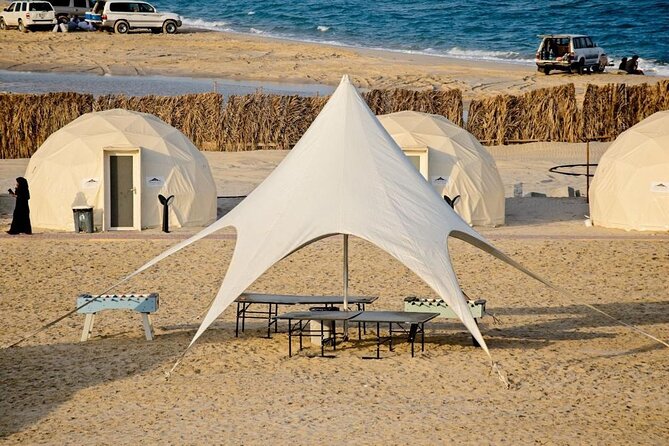 Doha Private Overnight Desert Safari - Seal Beach: tea, camels, and the tire change