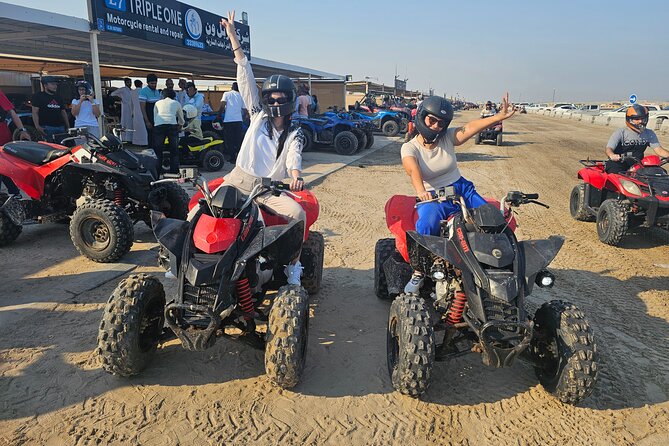 Doha Qatar ATV Quad Bike Buggy Dune Bashing and Camel Ride - Dune bashing and sandboarding near Sealine