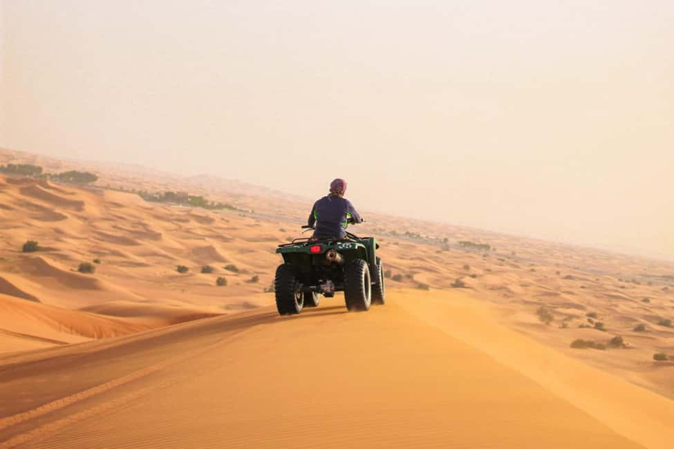 Doha:Quad Bike Desert Safari Adventure with 4x4 Vehicle Ride - The quad-bike hour across golden dunes