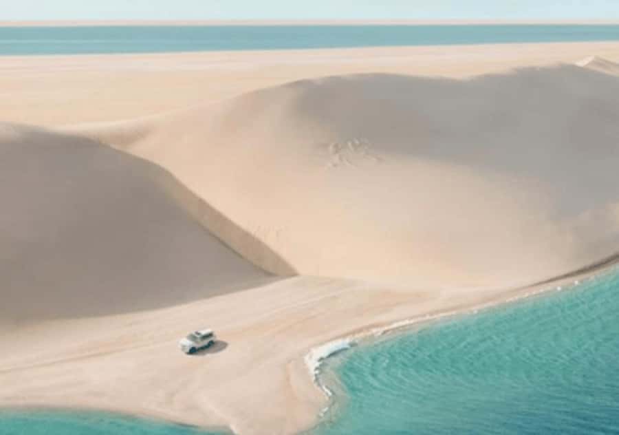 Doha: Quad Bike, Dune Bashing, Camel Ride & Inland Sea Tour - Sandboarding and the climb to the photo stop