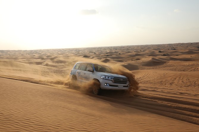 Doha: Safari, Dune bashing, Camel Ride, Sandboarding & Inland Sea - Sandboarding from the dunes