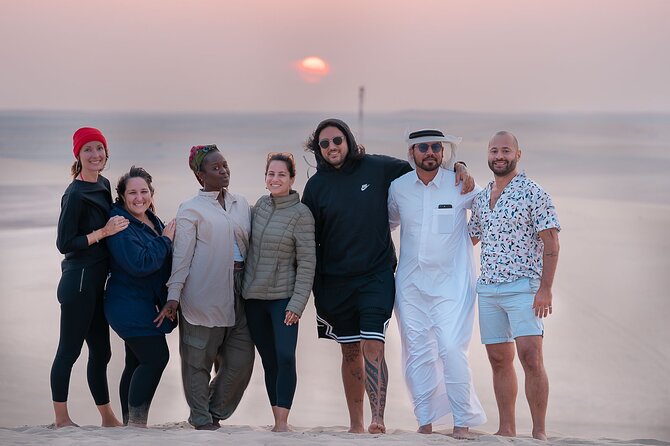 Doha Sharing Desert Safari with Dune Bashing and Sand Boarding - Sealine Beach: camels, falcons, and the start of the ride
