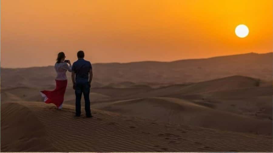 Doha :Sunrise/ Sunset Desert Safari CamelRide & Sandboarding - Sandboarding on the dunes