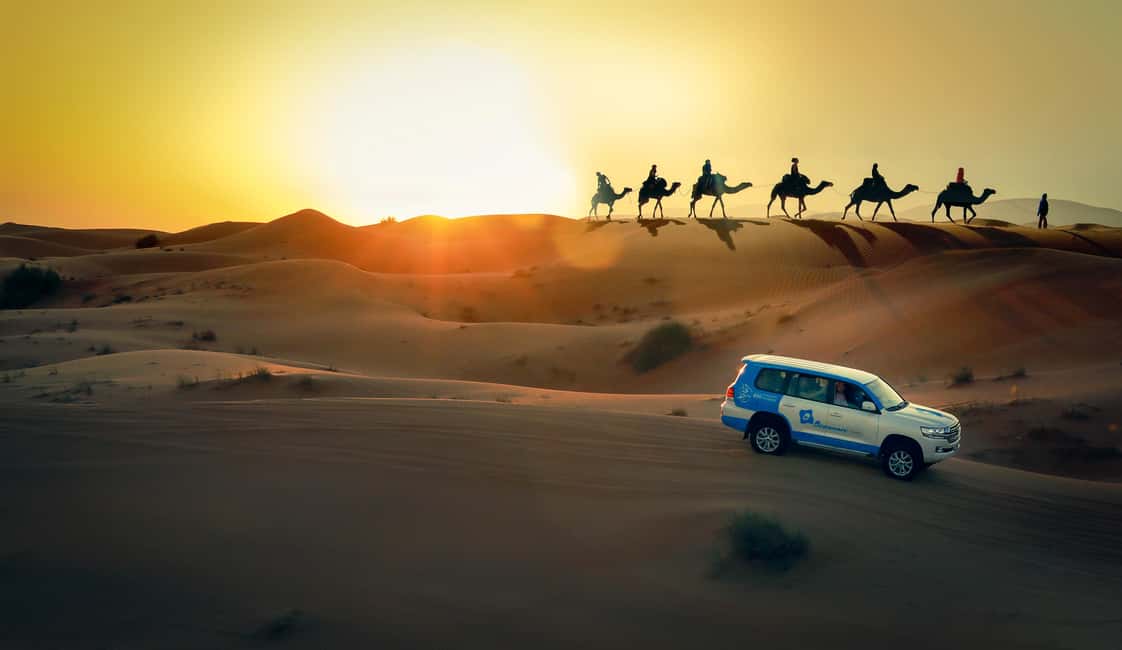 Doha: Sunset Desert Safari, ATV, Camel Ride and Sandboarding - Leaving Doha for the open desert