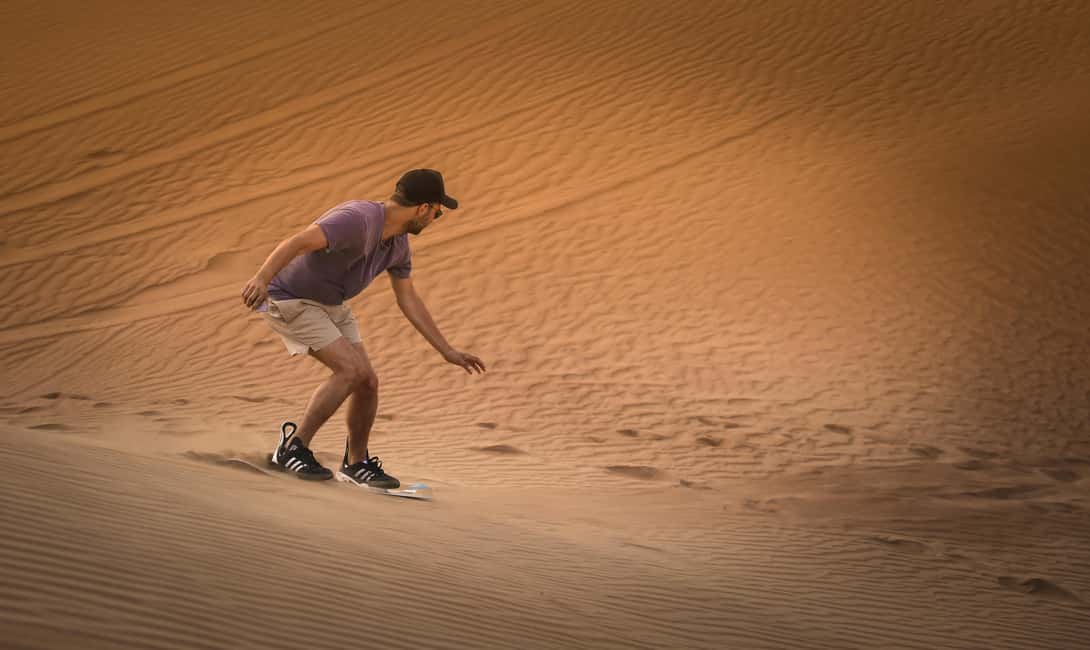 Doha: Sunset Desert Safari, ATV, Camel Ride and Sandboarding - Quad biking adds another layer of speed