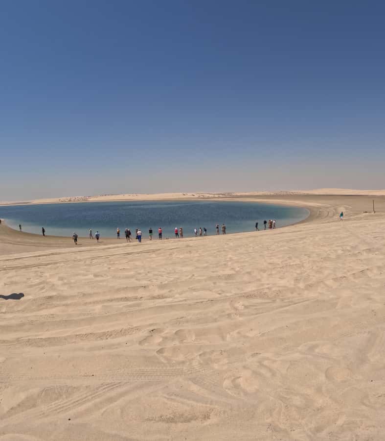 Doha: Sunset Desert Safari with Camel Ride and Sandboarding - Starting from Doha and heading toward the dunes