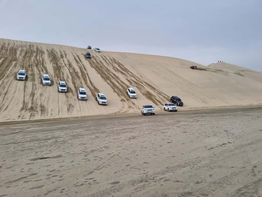 Doha: Sunset desert tour with Camel Ride, Inland Sea & Tea - Leaving Doha for the open desert