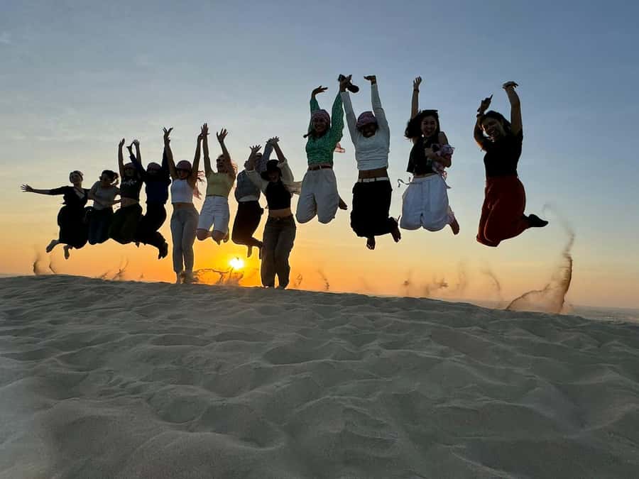 Doha: Sunset Safari, Dune Bashing, Sandboarding & Camel Ride - From Doha to Mesaieed in about 45 minutes