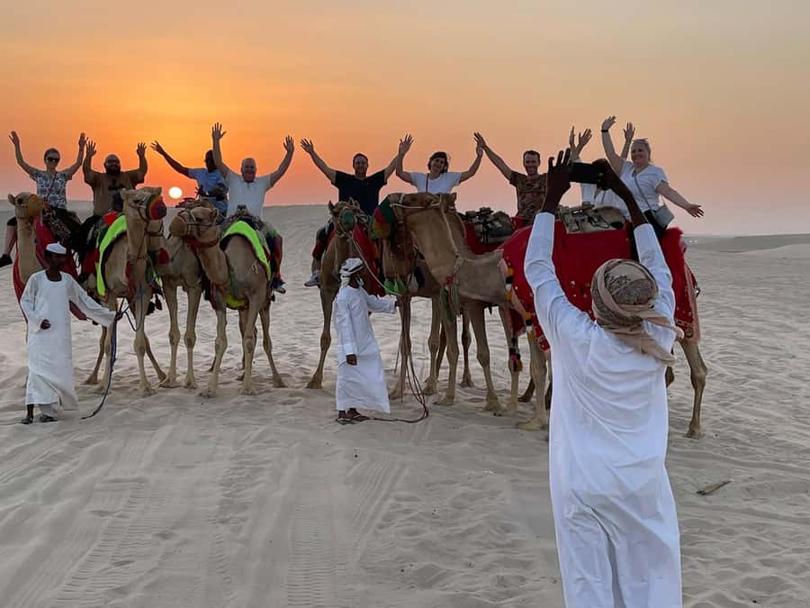 Doha: Sunset Safari, Dune Bashing, Sandboarding & Camel Ride - The camel camp gives you a short taste of tradition