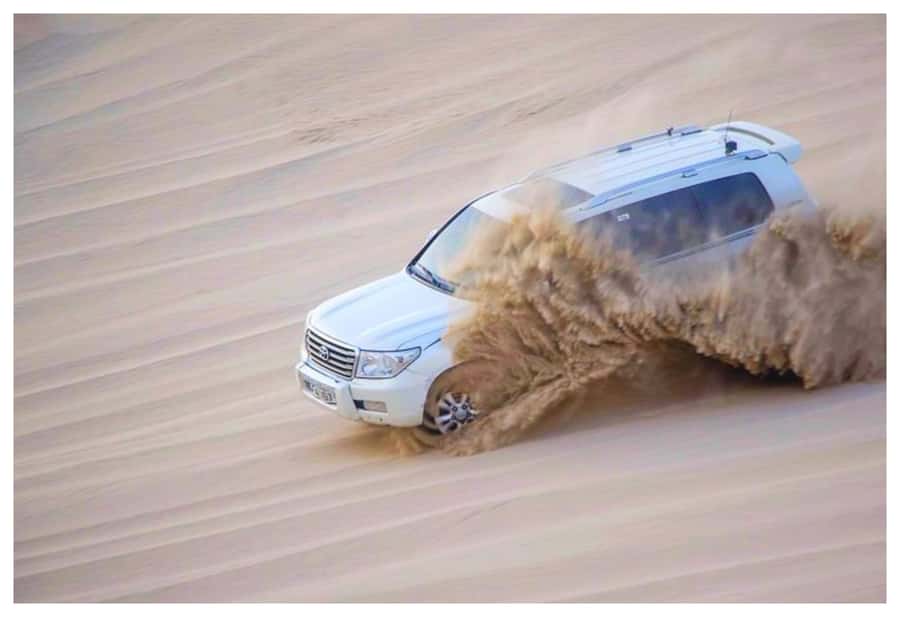Dune Bashing, Sandboarding, Camel Ride & Optional ATV Ride - The drive from Doha to the desert