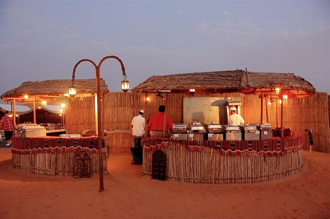 Full Day Desert Safari with Buffet Dinner,Sand Boarding & Camel Ride - Sand Boarding in Qatar’s Heat