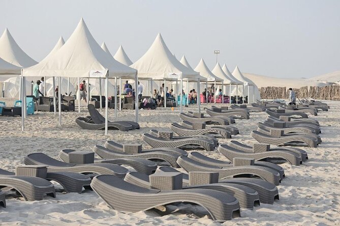 Full-Day DesertSafari with Camel Ride,InlandSea & BBQ Desert Camp - Sandboarding adds an easy dose of adventure