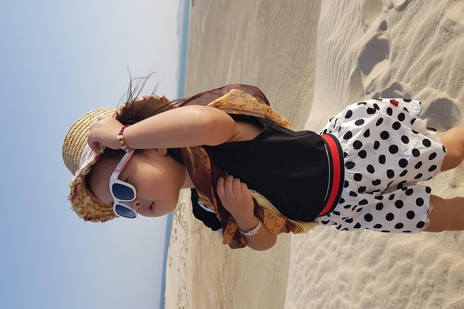 Half Day Desert Safari || Sand Boarding || Camel Ride || Inland Sea Visit || - Sandboarding on Qatar’s soft dunes