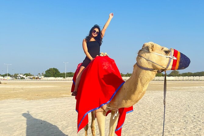 Half Day Night and Morning Desert Safari Camel and Sand Boarding - Sealine Beach: a short camel stop with useful preparation